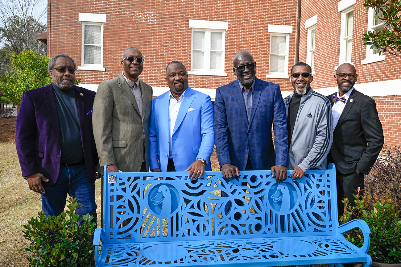 Virgil, third from left, stands with his Omega Psi Phi fraternity brothers.