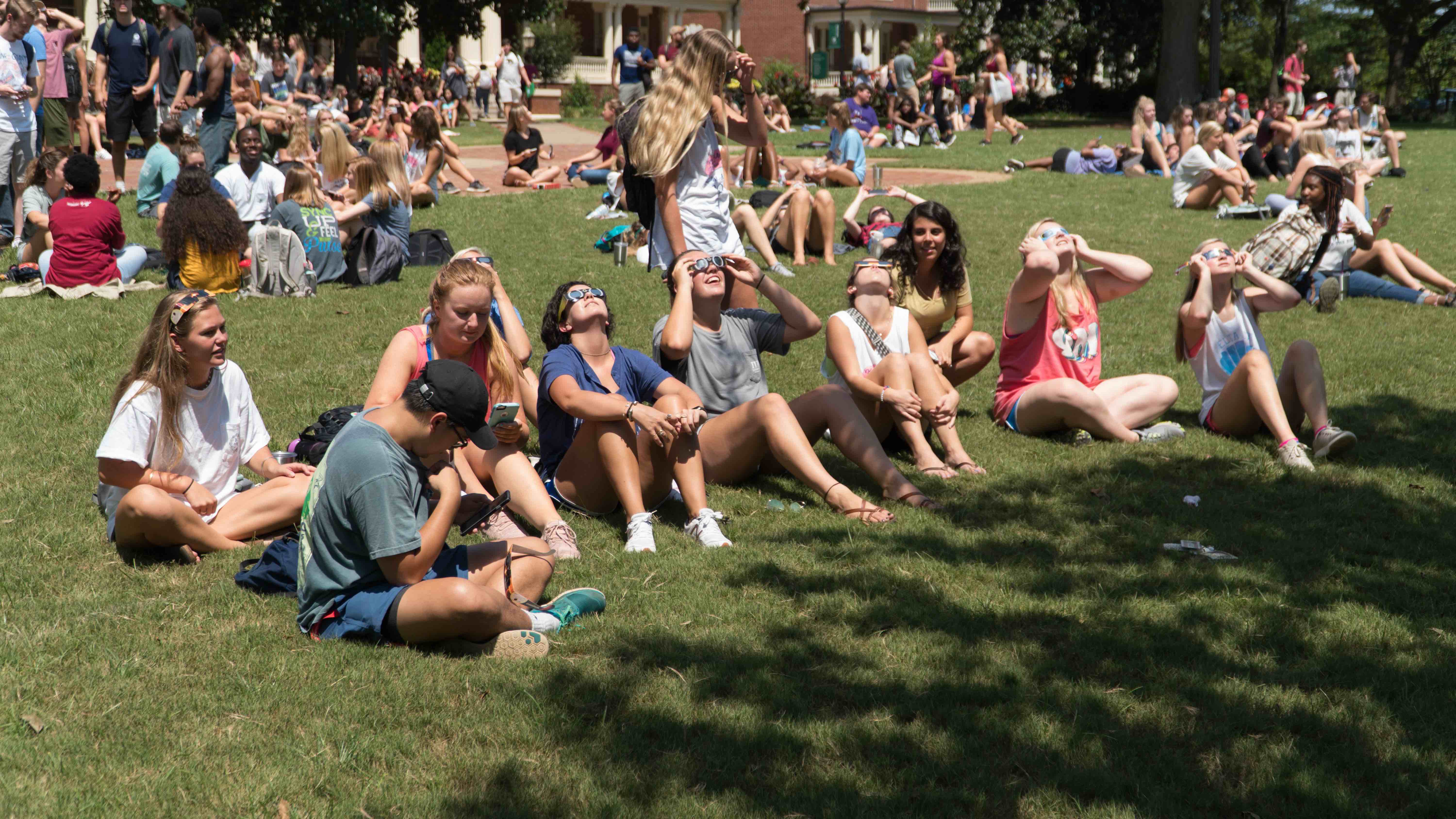 Hundreds of students watched the partial solar eclipse on the first day of classes in August 2017 on Front Campus.