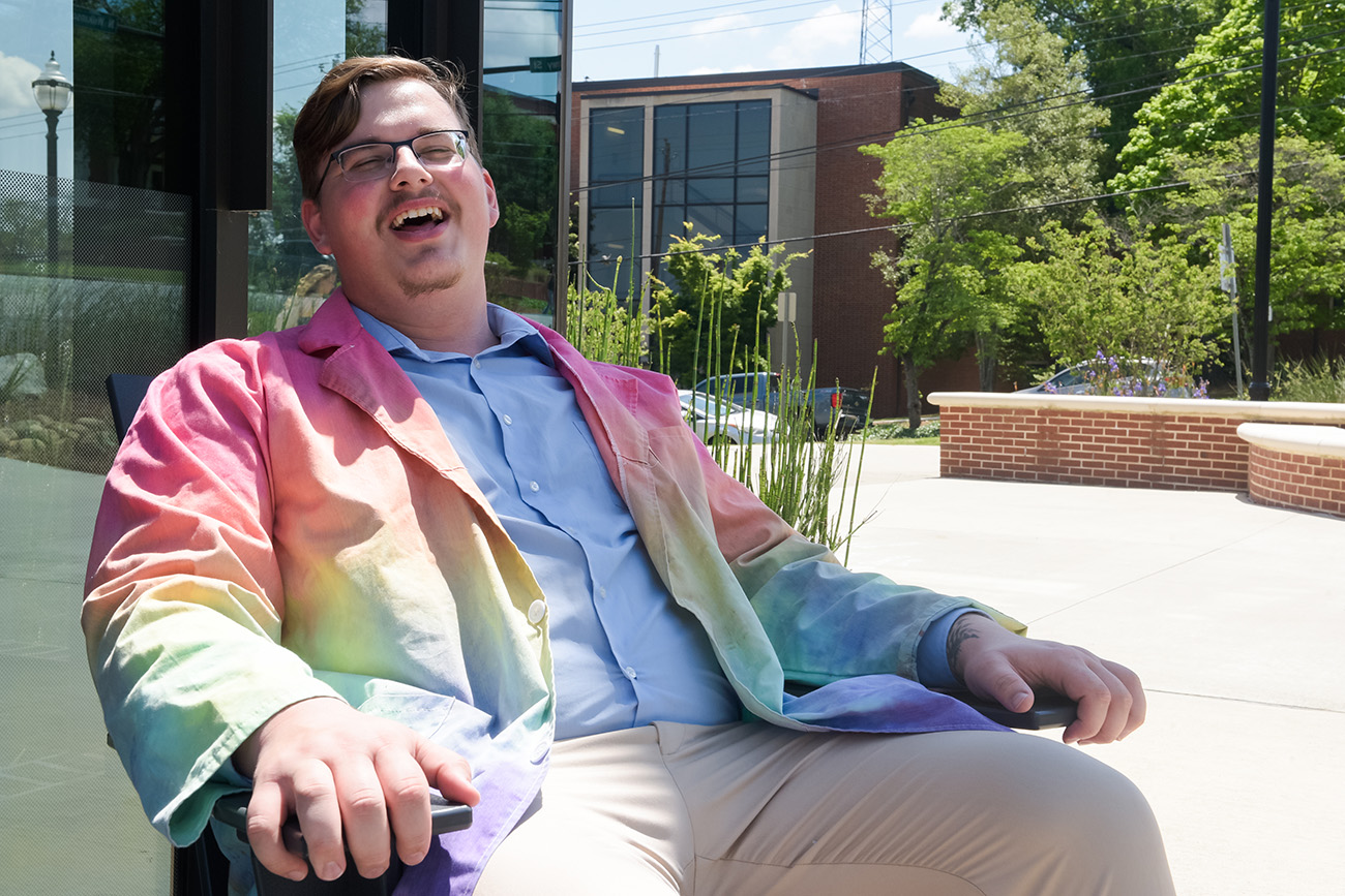 Cole in the Science Education Center's trademark tie-dye lab coat.