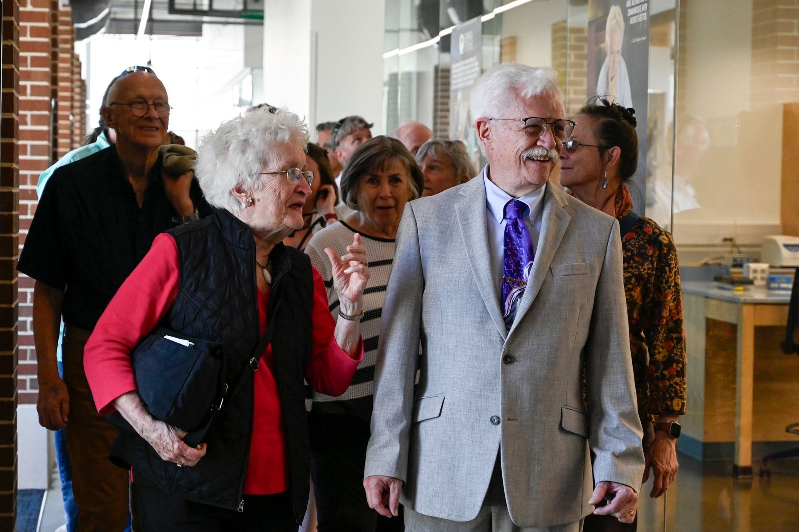 Mr. and Mrs. Kenneth Saladin enjoy a tour of the Integrated Science Building, which now bears Saladin's name.