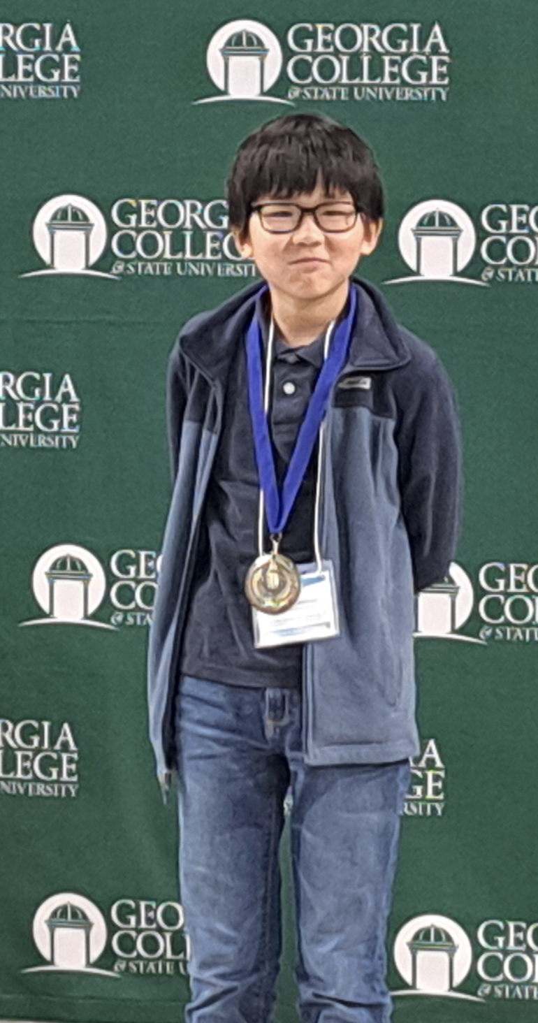 Sosuke Nishimiya, a fifth grader from Springdale Elementary School, won a medallion for Grand First Place in the elementary division at GCSU's recent K-5 State Science Fair.
