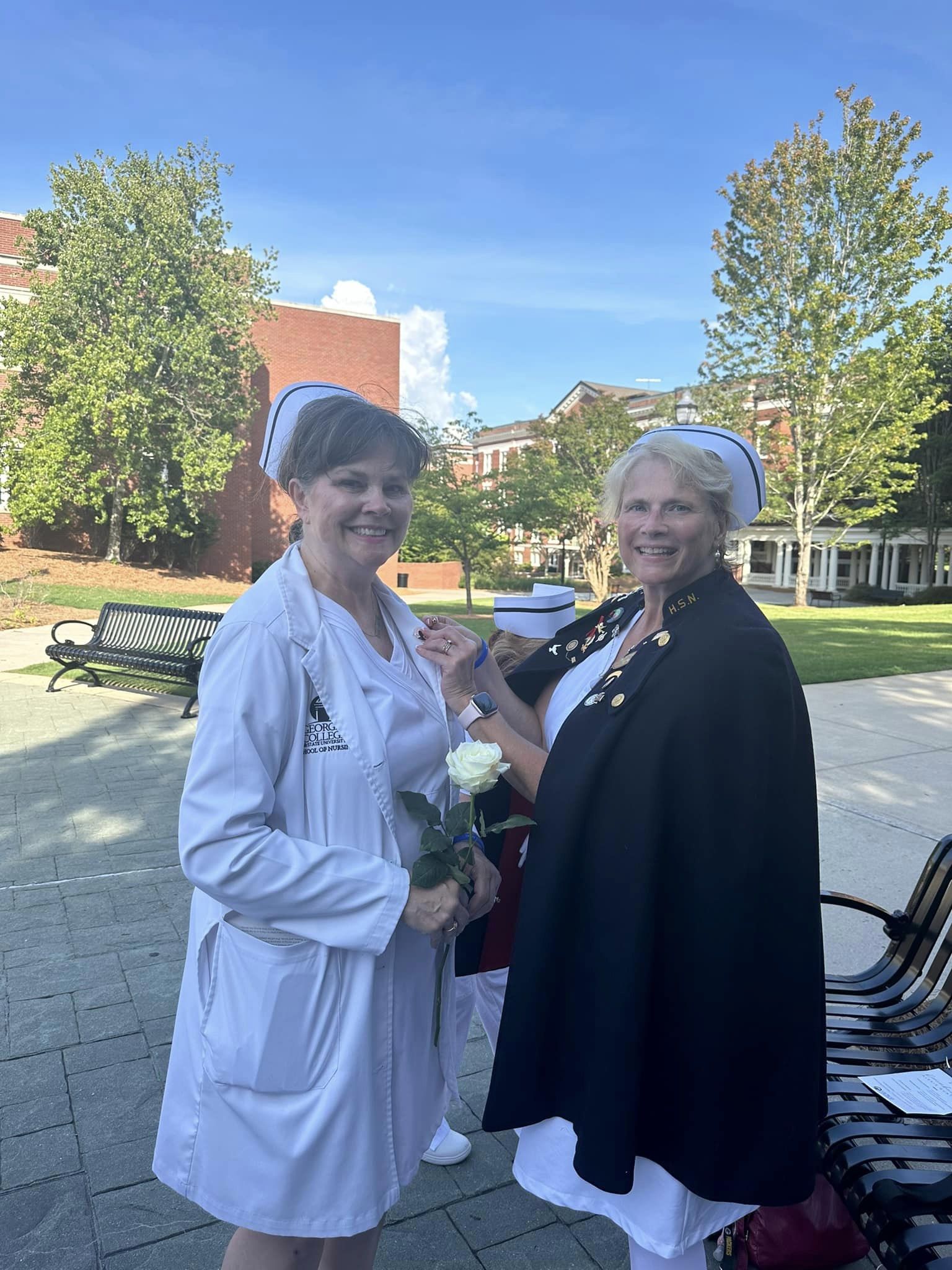GCSU Nursing faculty Marcia Henry, left, and Dr. Amy Malcom are members of the Nurse Honor Guard.