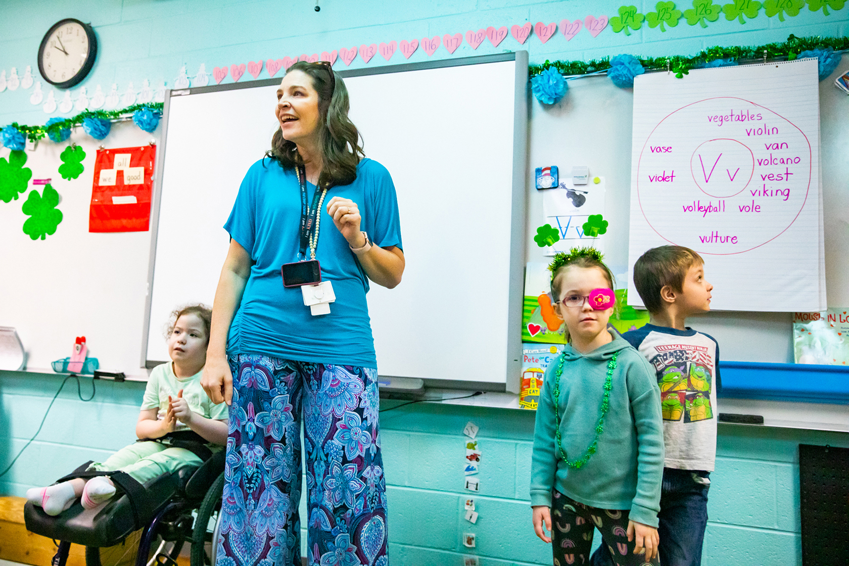 Holly Witcher works with her students.