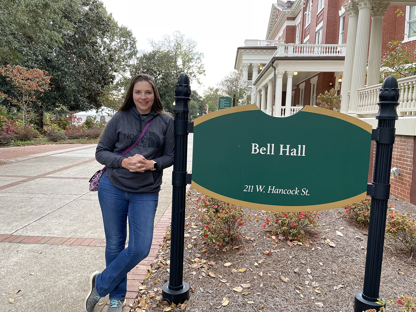 Holly Witcher stands by Bell Hall marquee