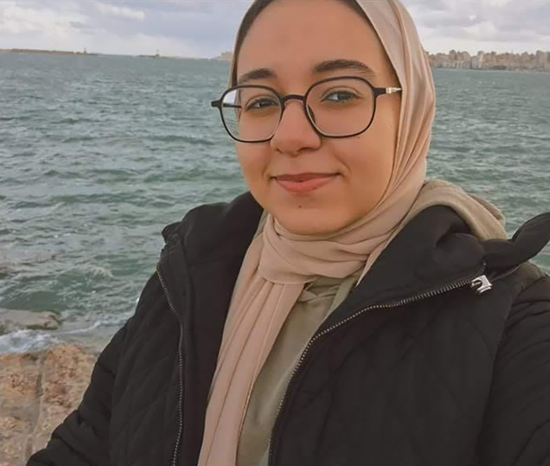 Farah Dawood is pictured in front of the Mediterranean seashore in Alexandria, Egypt.