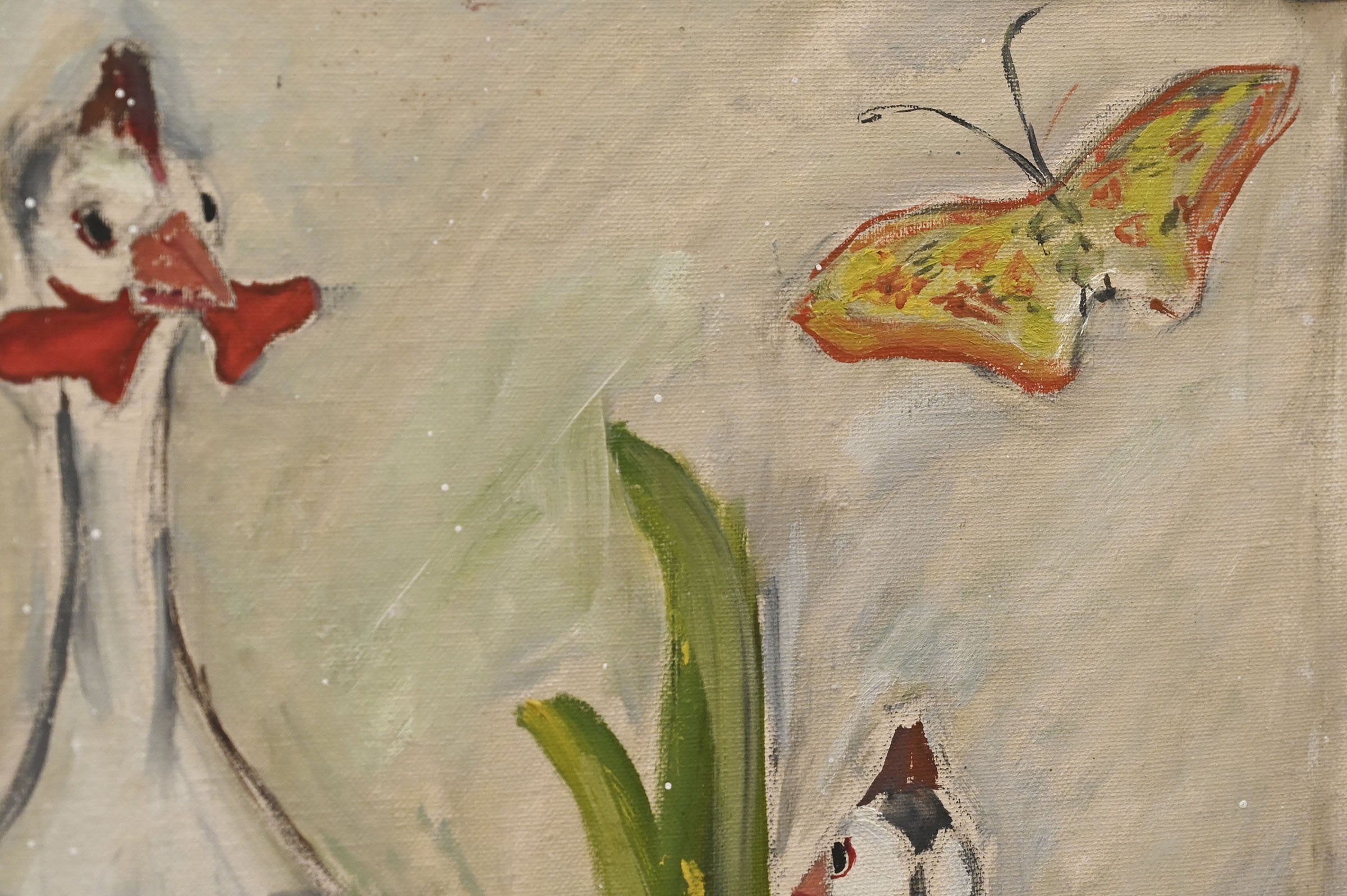 Close-up detail of one of Flannery's paitings featuring a chicken and a butterfly