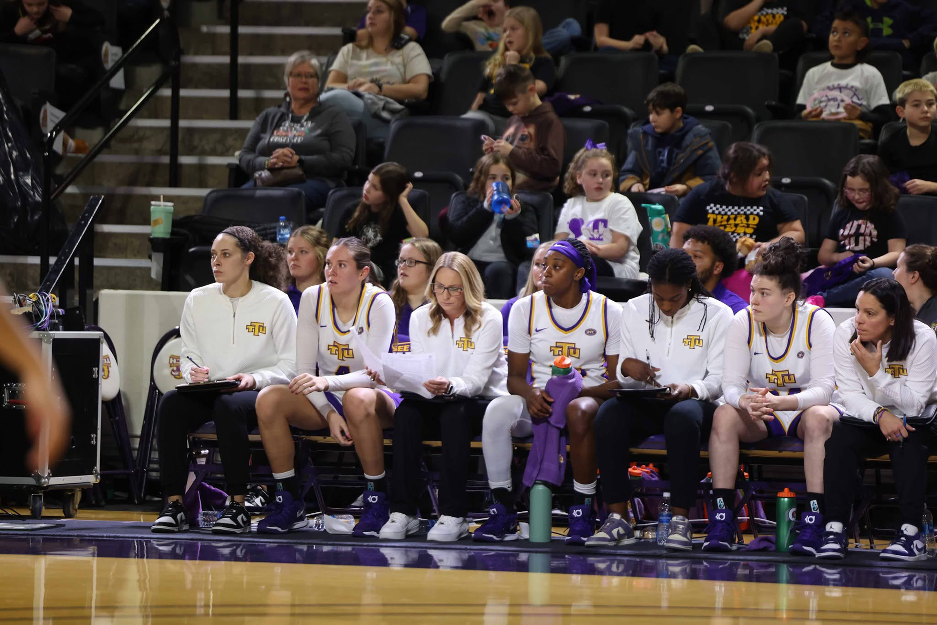 Melanie Walls reviews plays during a game.