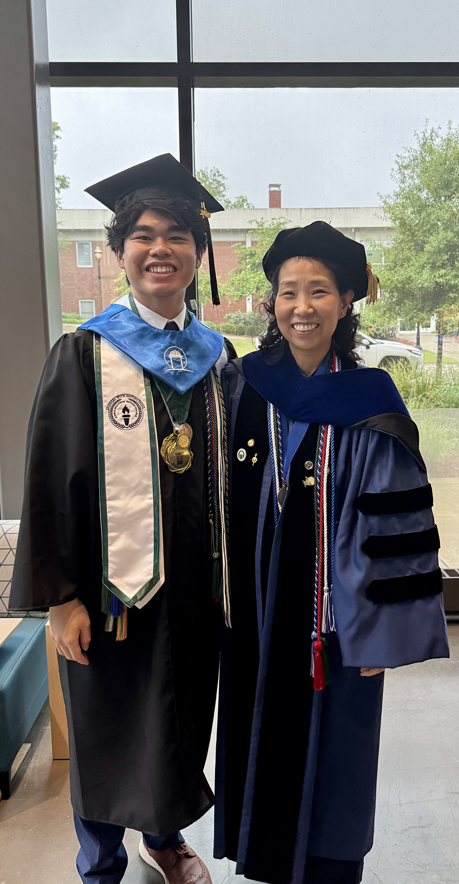 Dr. Y. Ellen France and Ivan Chu at Commencement