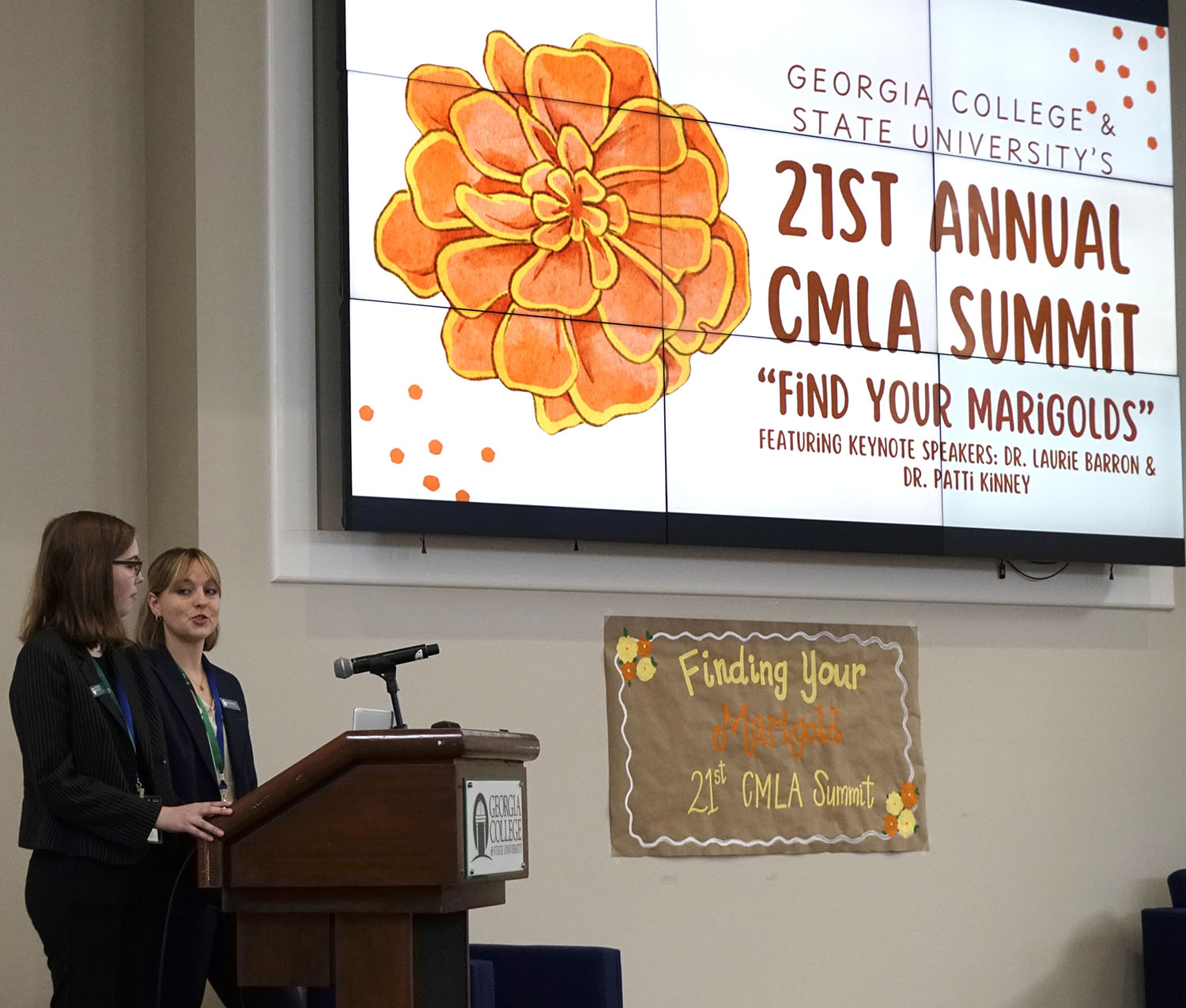 Seniors Kylie Totten and Grayson Riggott co-chaired the 21st CMLA conference at Georgia College. (Photo: Ian Wesselhoff)