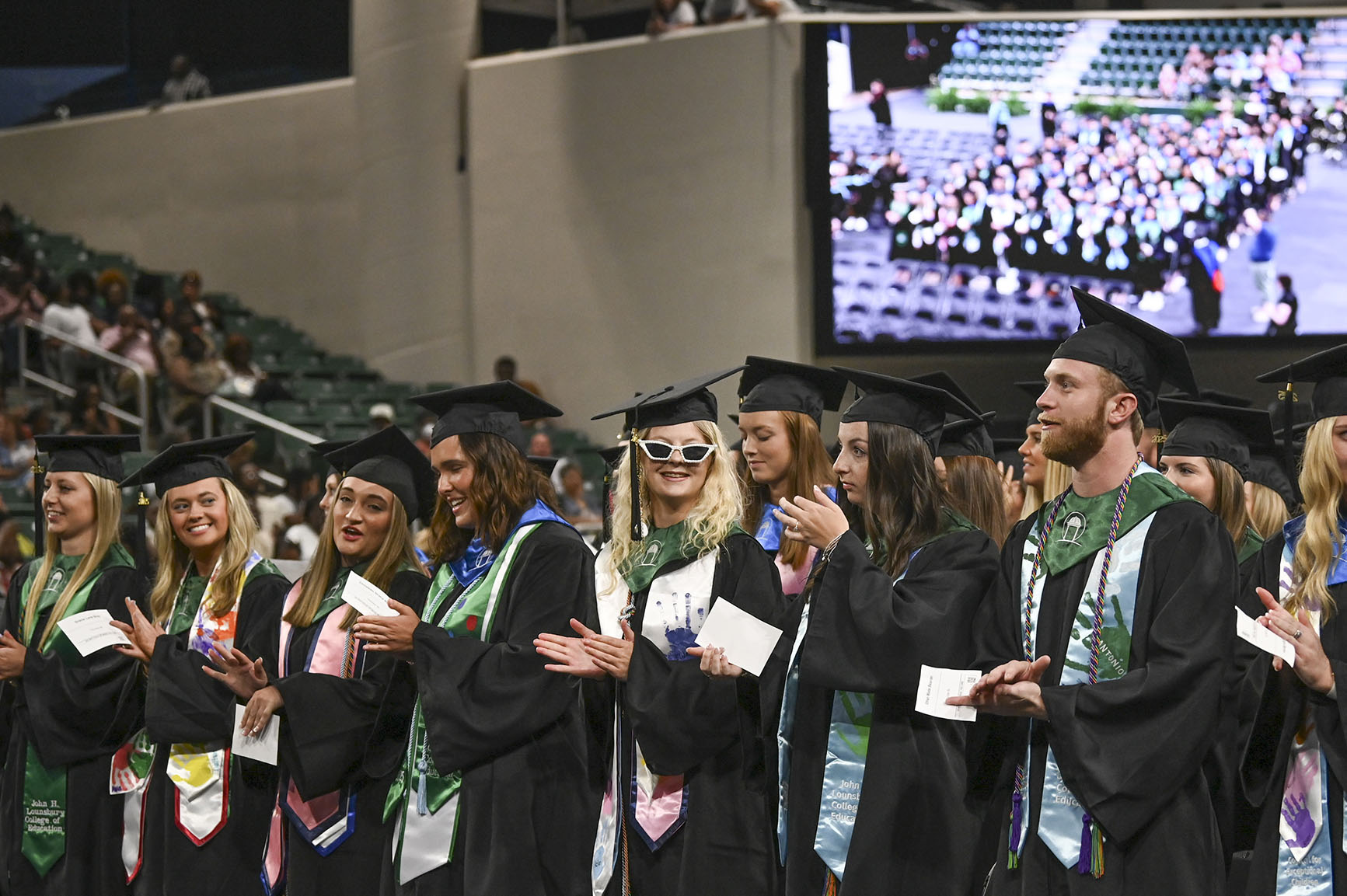 Ethan Bearden far right commencement