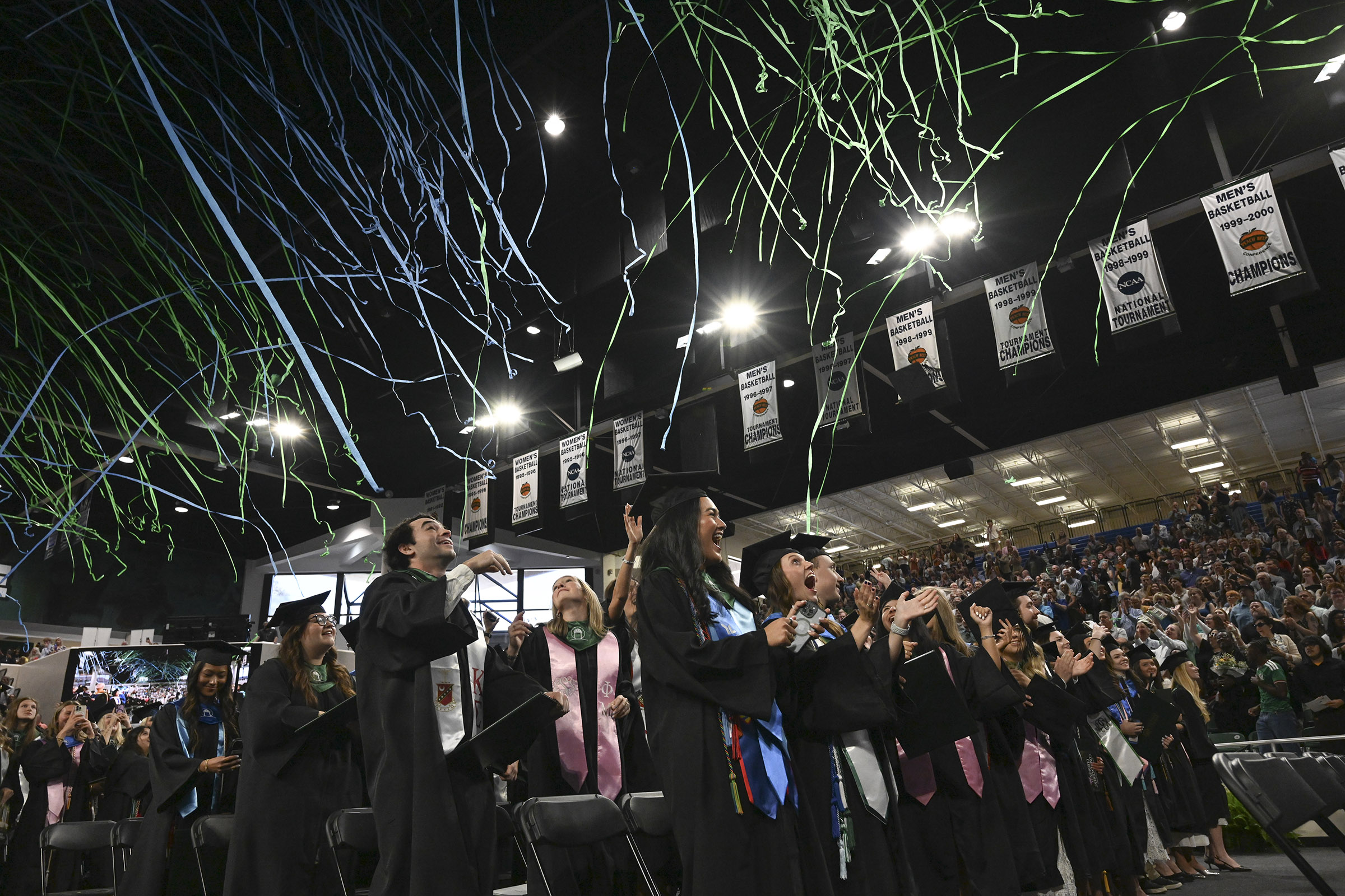 Commencement photo with streamers in Centennial Center
