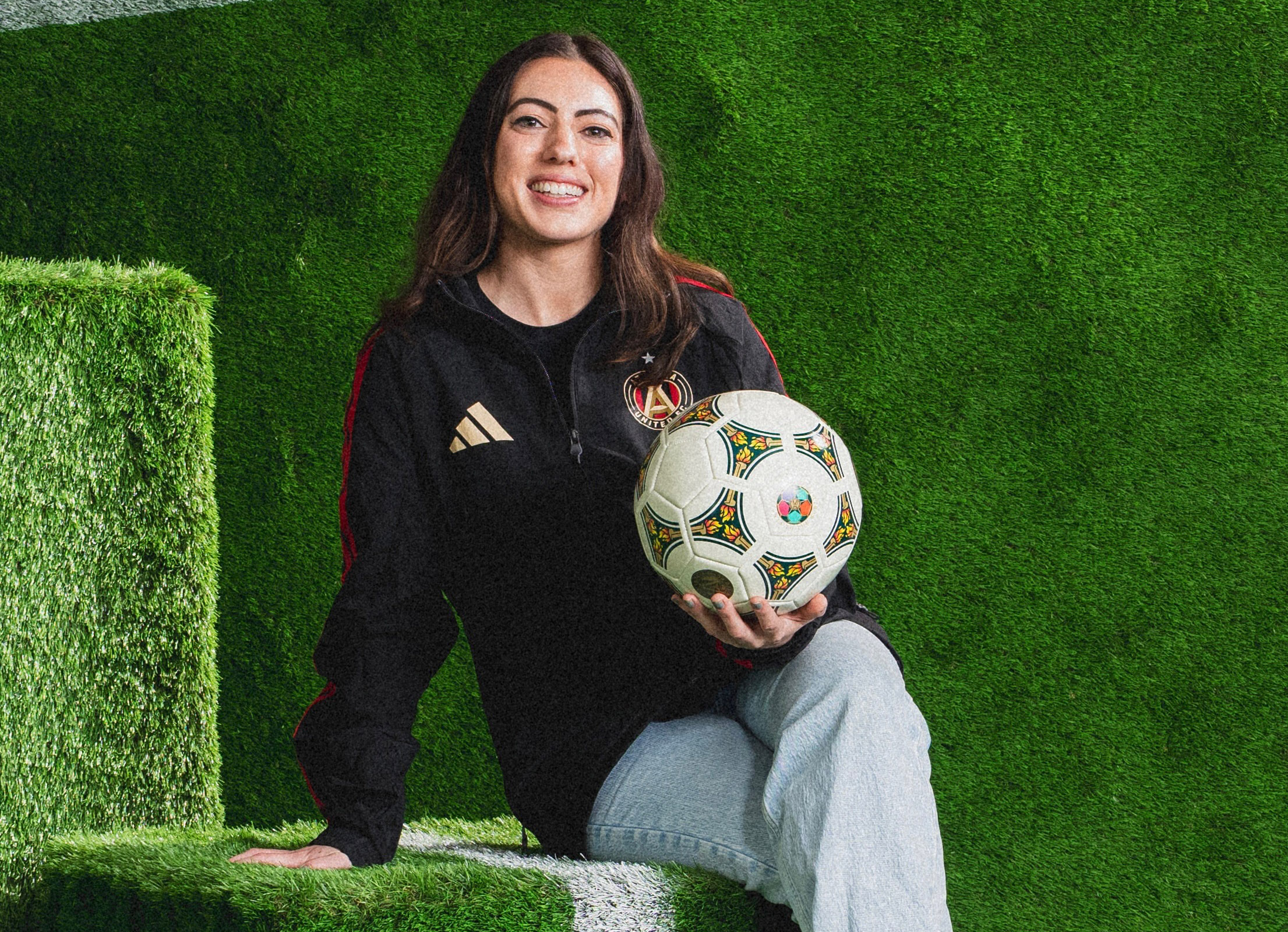 Becca Fallon with a soccer ball