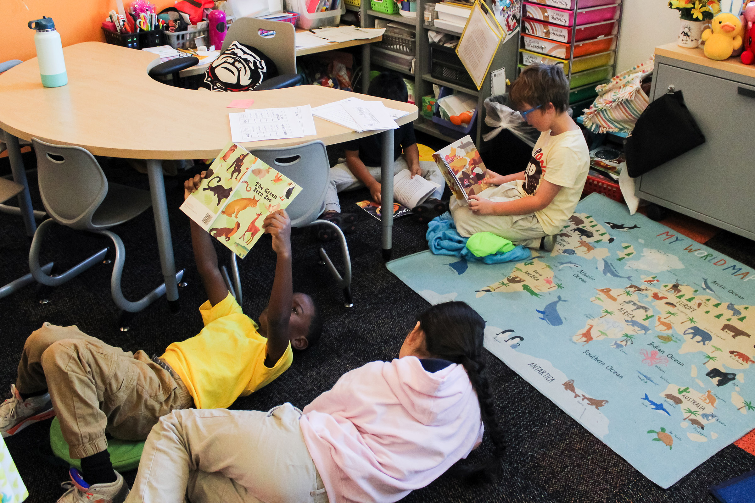 Students in an elementary school classroom reading