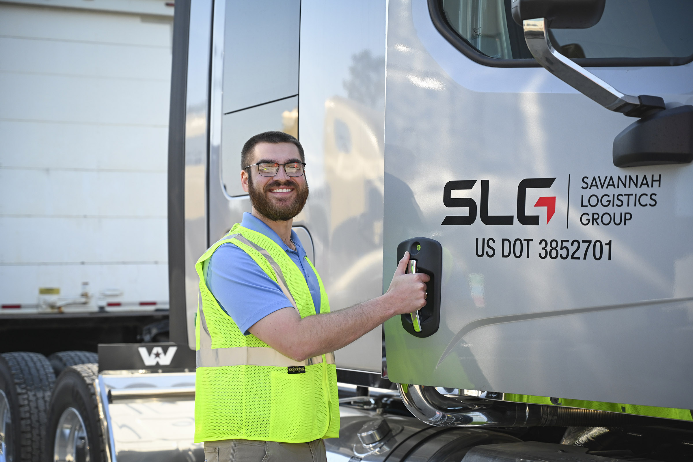 Gavin Holloway with SLG truck
