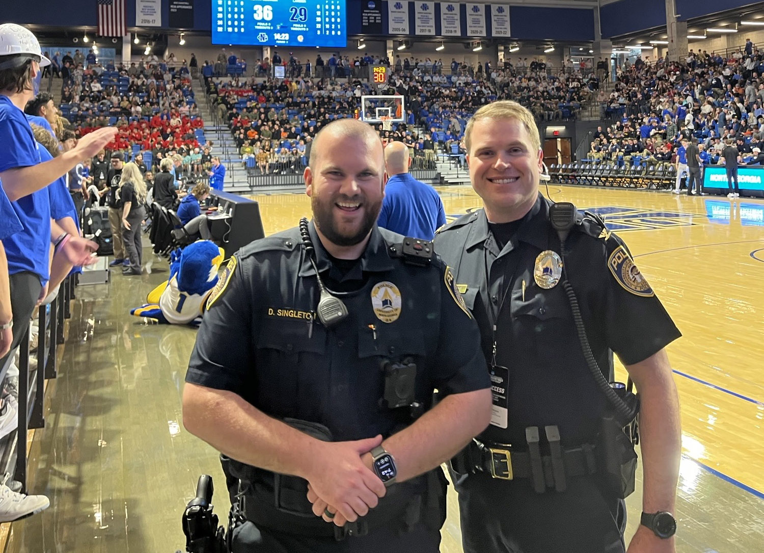 Greg Williams at right at UNG basketball game
