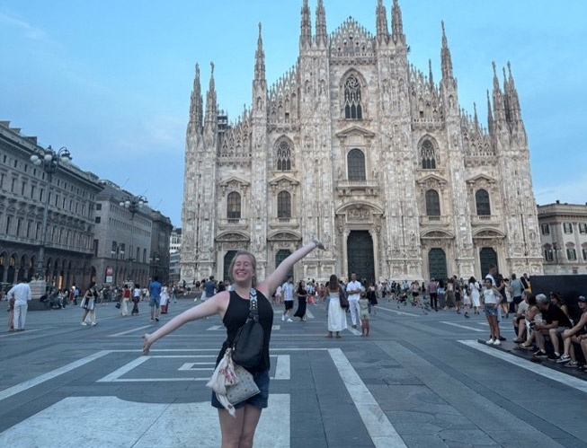 Maggie Creekmore in front of the Duomo in Milan