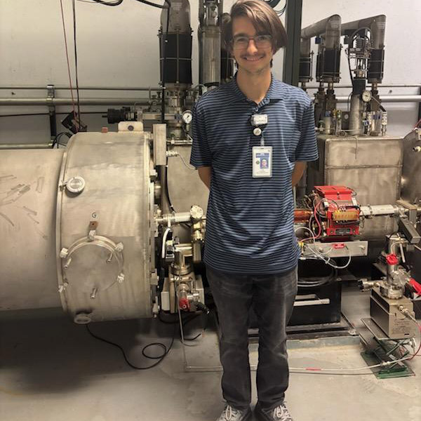 Doredant with the particle accelerator. (Photo: Jude Doredant)