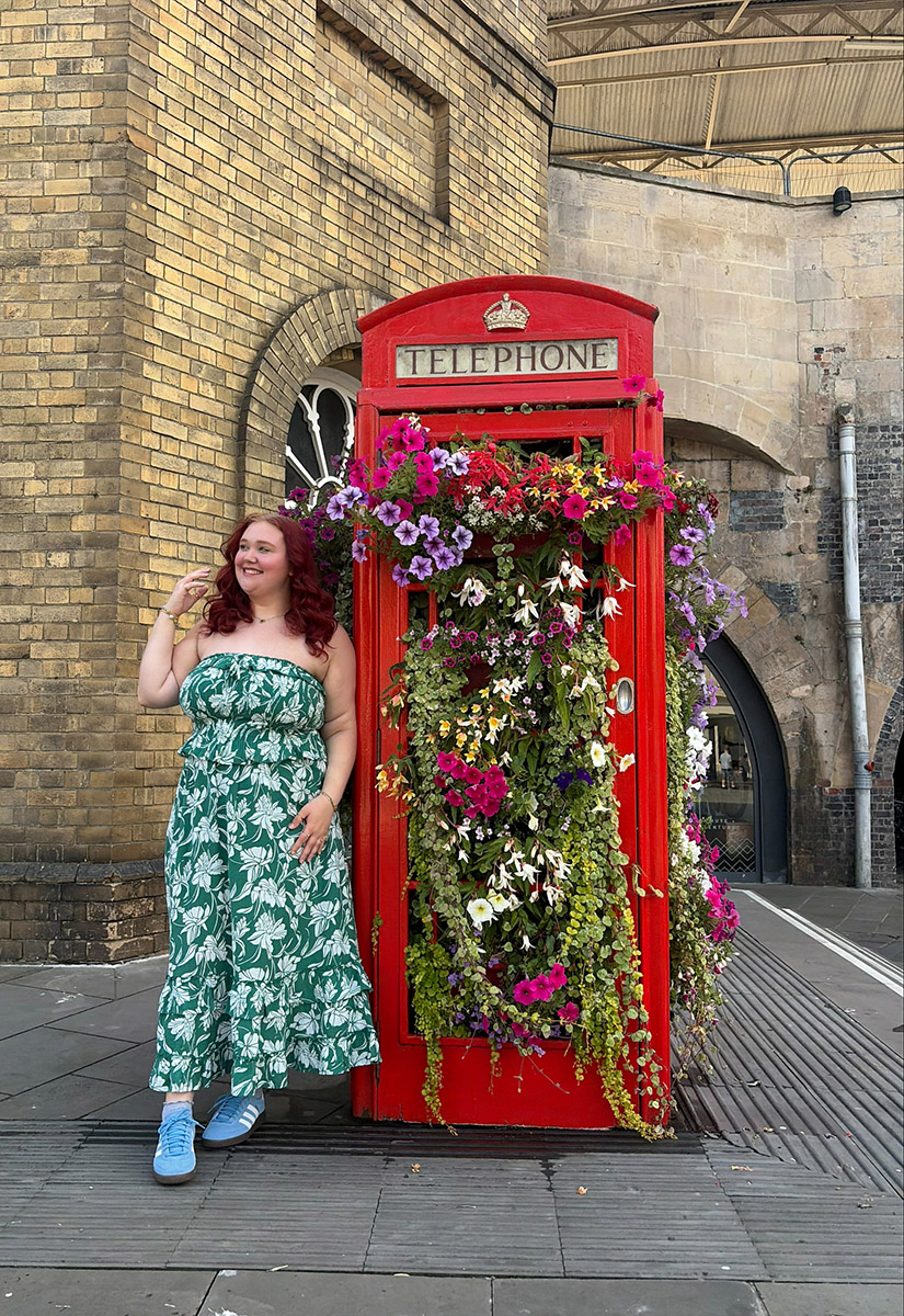 Gilman Scholar Mary Piper poses with a decorative phone box in London. (Photo: Mary Piper)