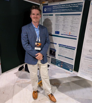 Morgan Collins presents at the International Sol-Gel Conference. (Photo: Catrena Lisse)