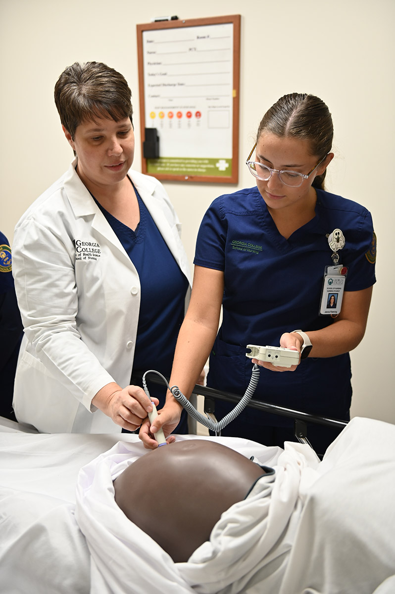 Dr. Denise Cochran leads students through hands-on learning experiences at the GCSU Sim Center. (Photo: Gil Pound)