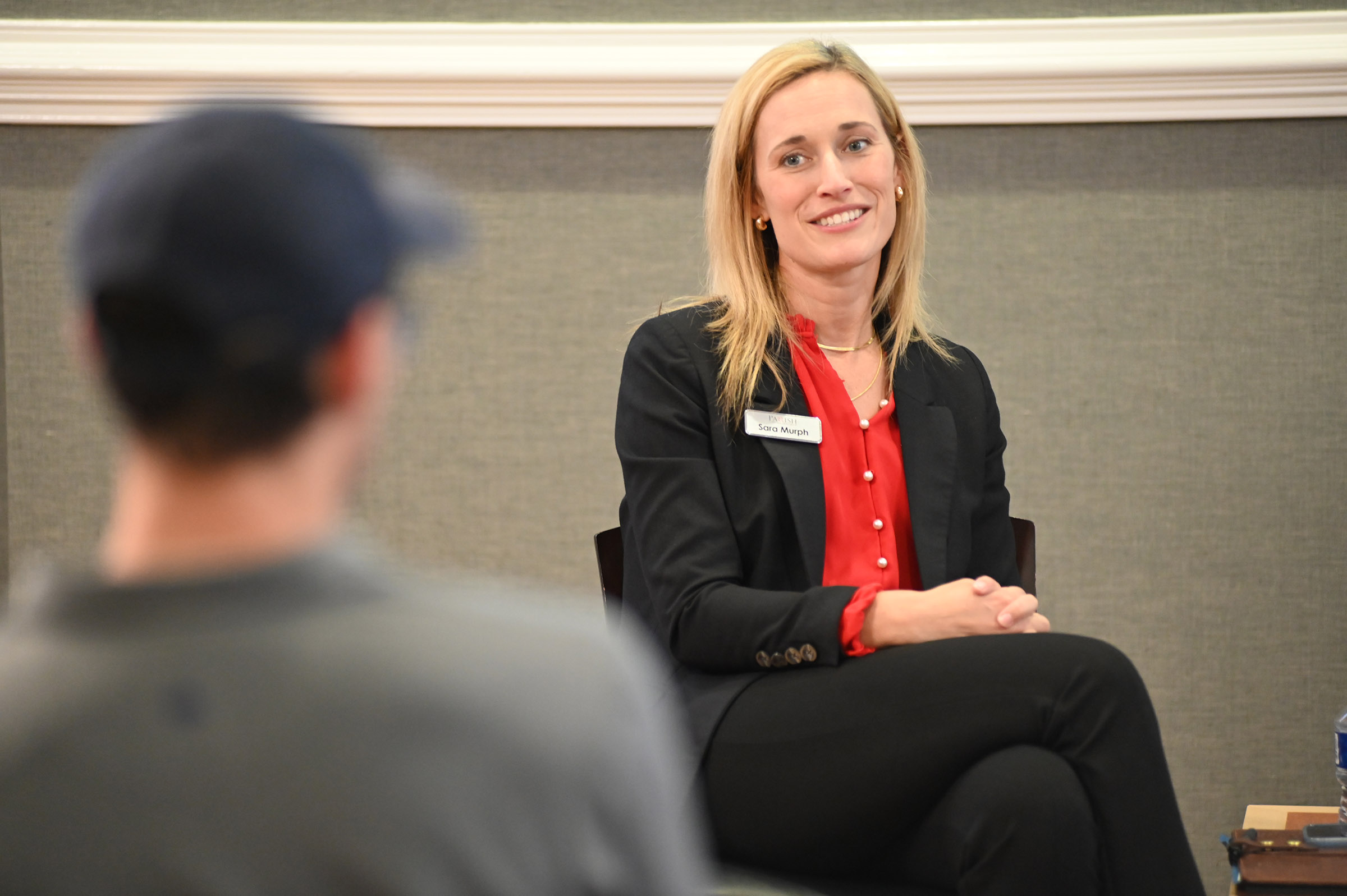 Murph speaking at an open panel and an accounting class. 