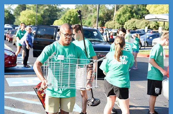 The Cat Crew assists GCSU students moving into West Campus Village today