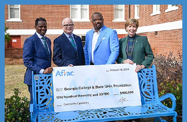 GCSU alumnus presents $100,000 check to GCSU on behalf of Aflac