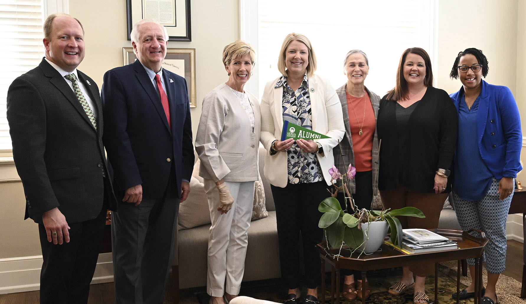 Dr. Roberts, center, with members of the Executive Cabinet and alumni assocation