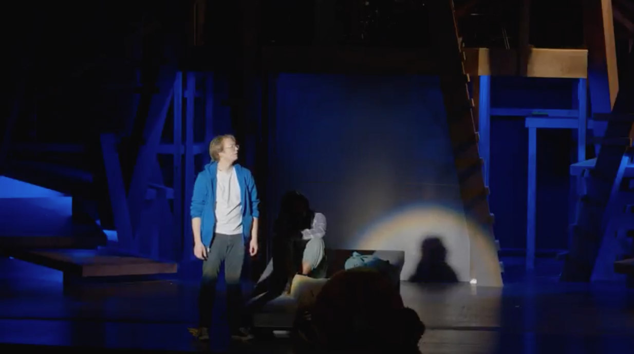 Ryan Merchant on stage as Percy Jackson.