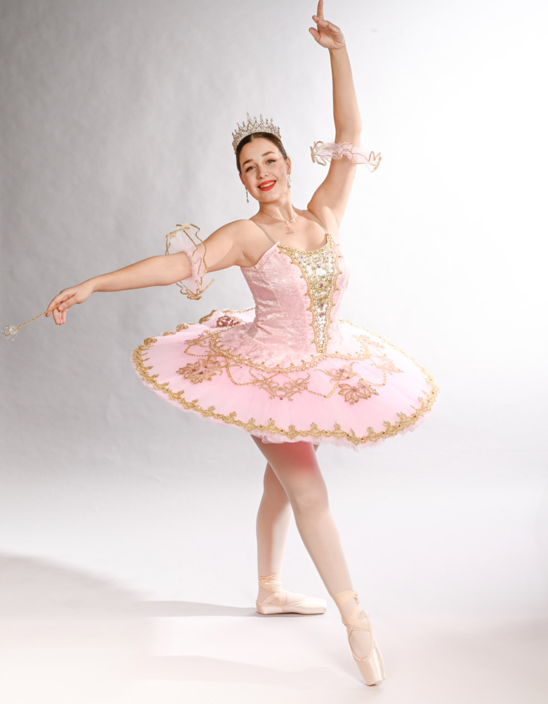  An image of Nicole in a pink ballet tutu. 