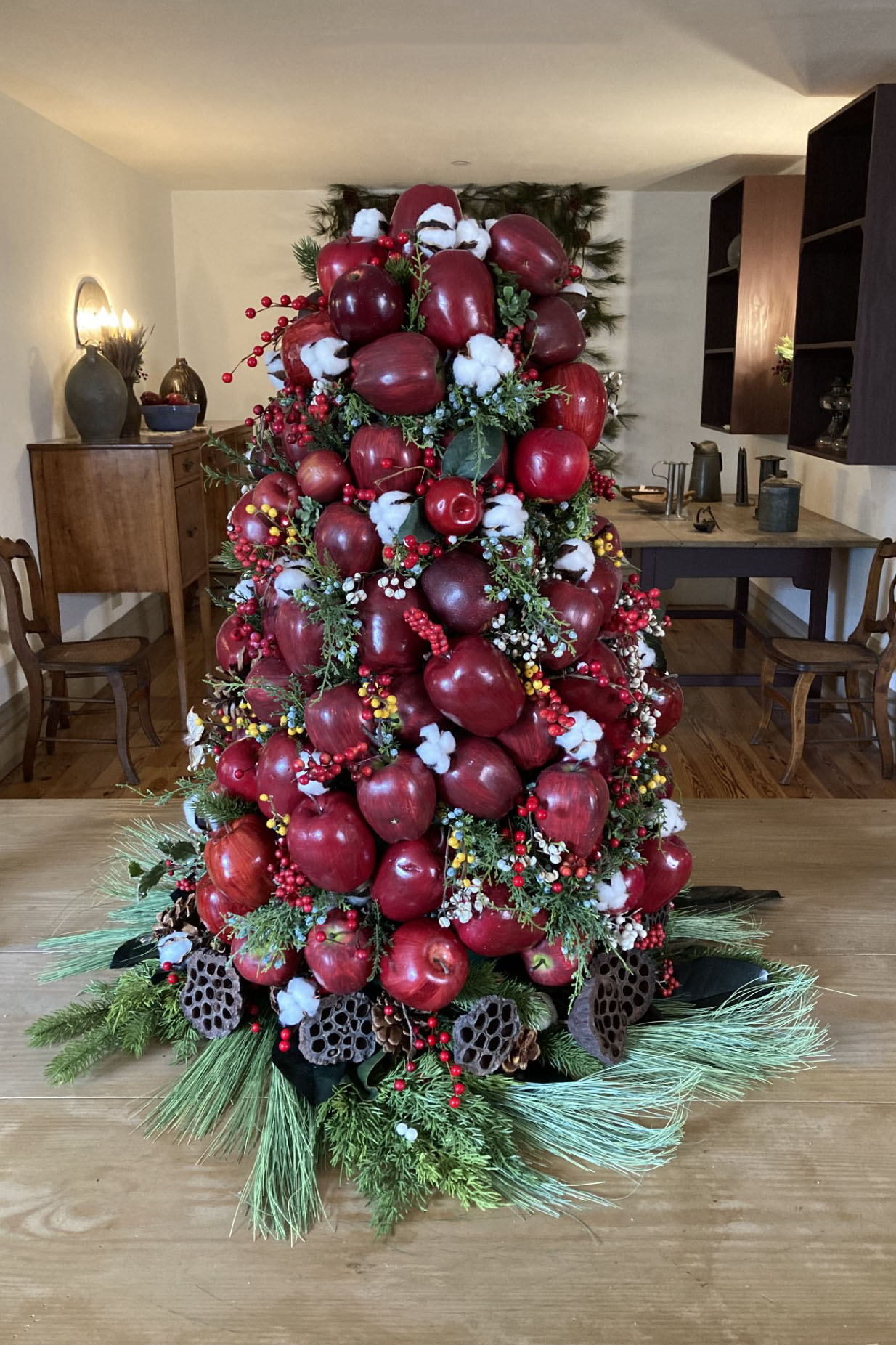 A Christmas tree in Georgia's Old Governor's Mansion is decorated in apples and popcorn