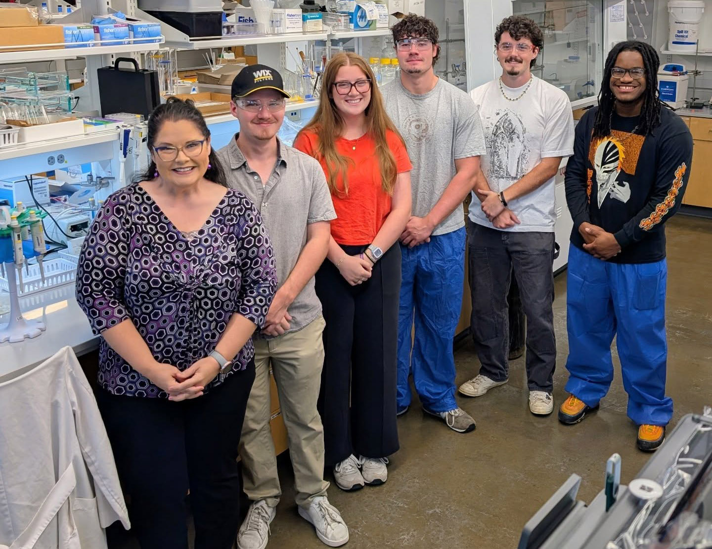 Dr. Lisse with the five chemistry students accepted to the Sol-Gel conference