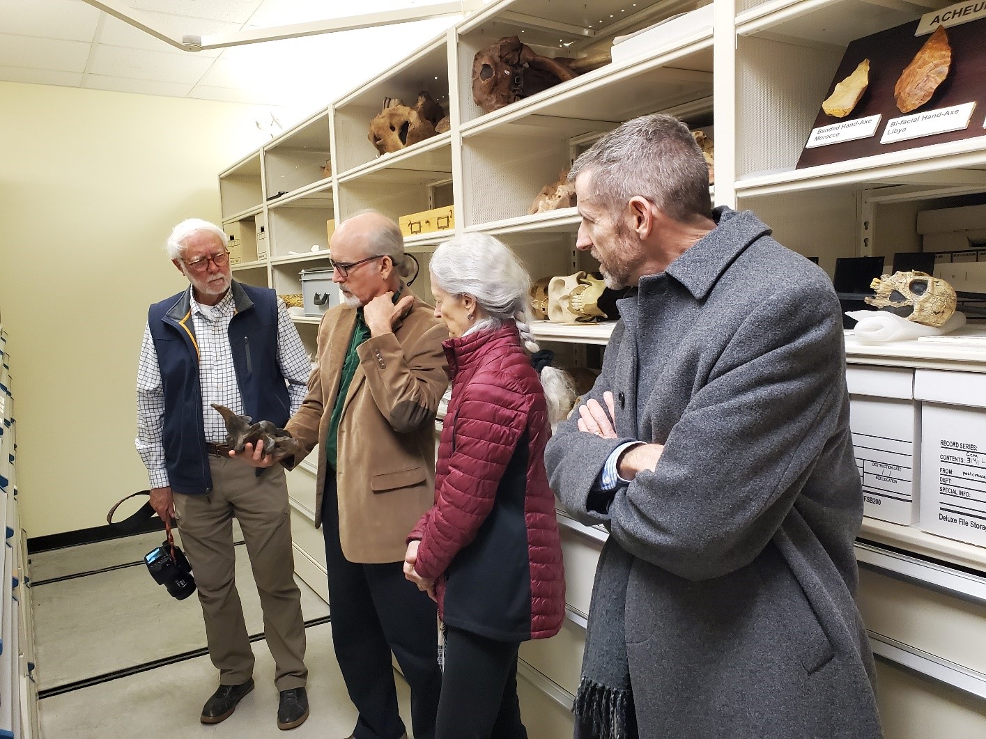 Dr. Clough, Dr. Mead, Ms. Loftman and Dean Tenbus discuss cervical vertebrae from Giant Bison recovered from Georgia (H. Mead)